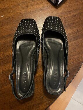 Alohas studded slingback kitten heels.
